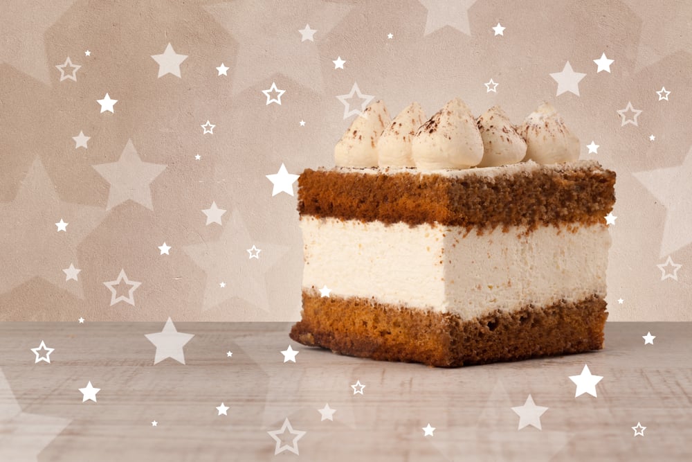 Close up of a delicious colorful cake with star shapes on background